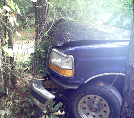 Truck crashes into Tree