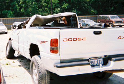 Dodge White truck wrecked