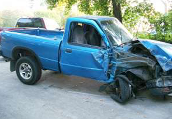 Truck Runs into Tree