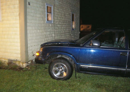 Truck Hits House