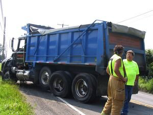 Dump Truck Meets Passenger Car