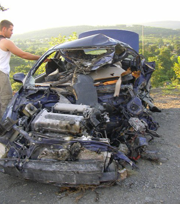 Side Swiped Dump Truck: Ejected