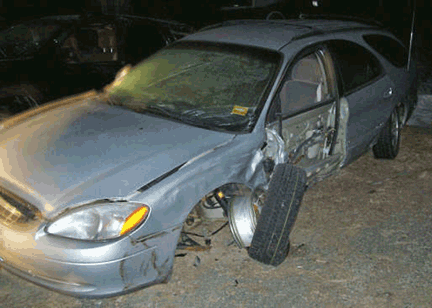Ford Taurus SideSwiped: Crashes into Tree