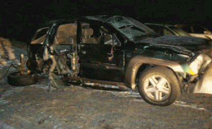 Car Spun and Crashed into Rock Wall