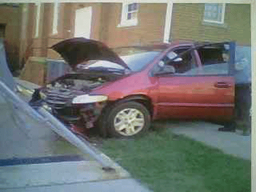 Van crashes into church