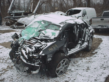 Mitsubishi Lancer Wrecked on Tree