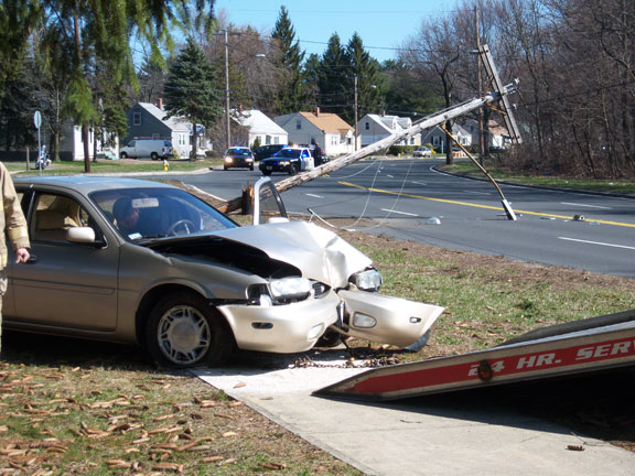 Infiniti Crash accident telephone pole