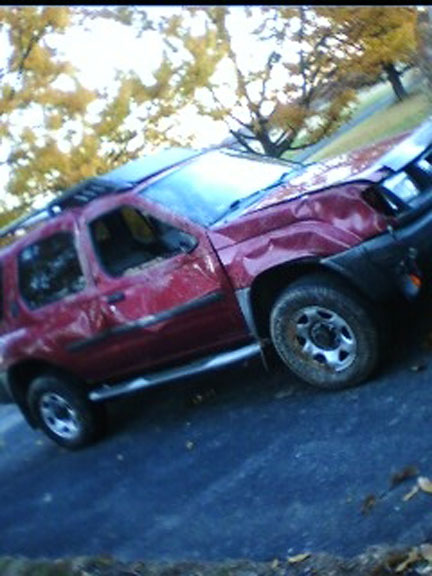 Xterra rollover crash in wet fog