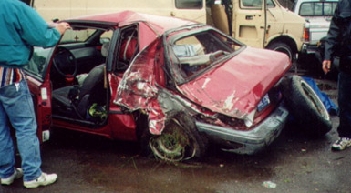 Dodge Shawdow Crushed by Semi Truck