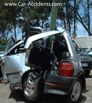 Cra cRashes into light Pole